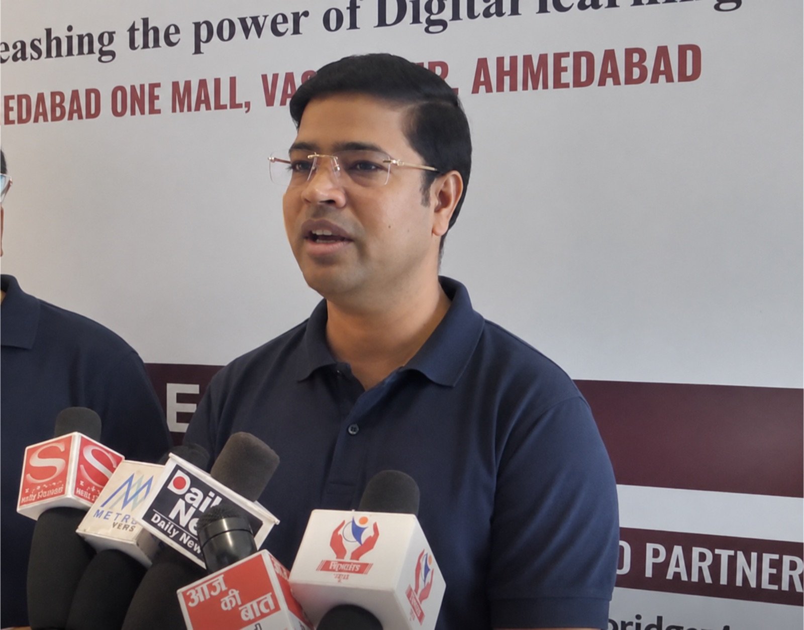 Sachin Shrivastava speaking with members of the media